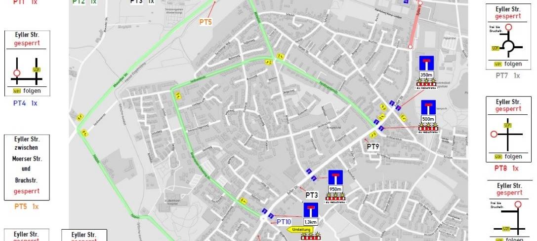 Ein Straßenschild aus Deutschland, das im Hintergrund gelb ist und die schwarze Aufschrift "Umleitung" trägt, steht vor einer Straßenkulisse mit einer begrünten Allee.